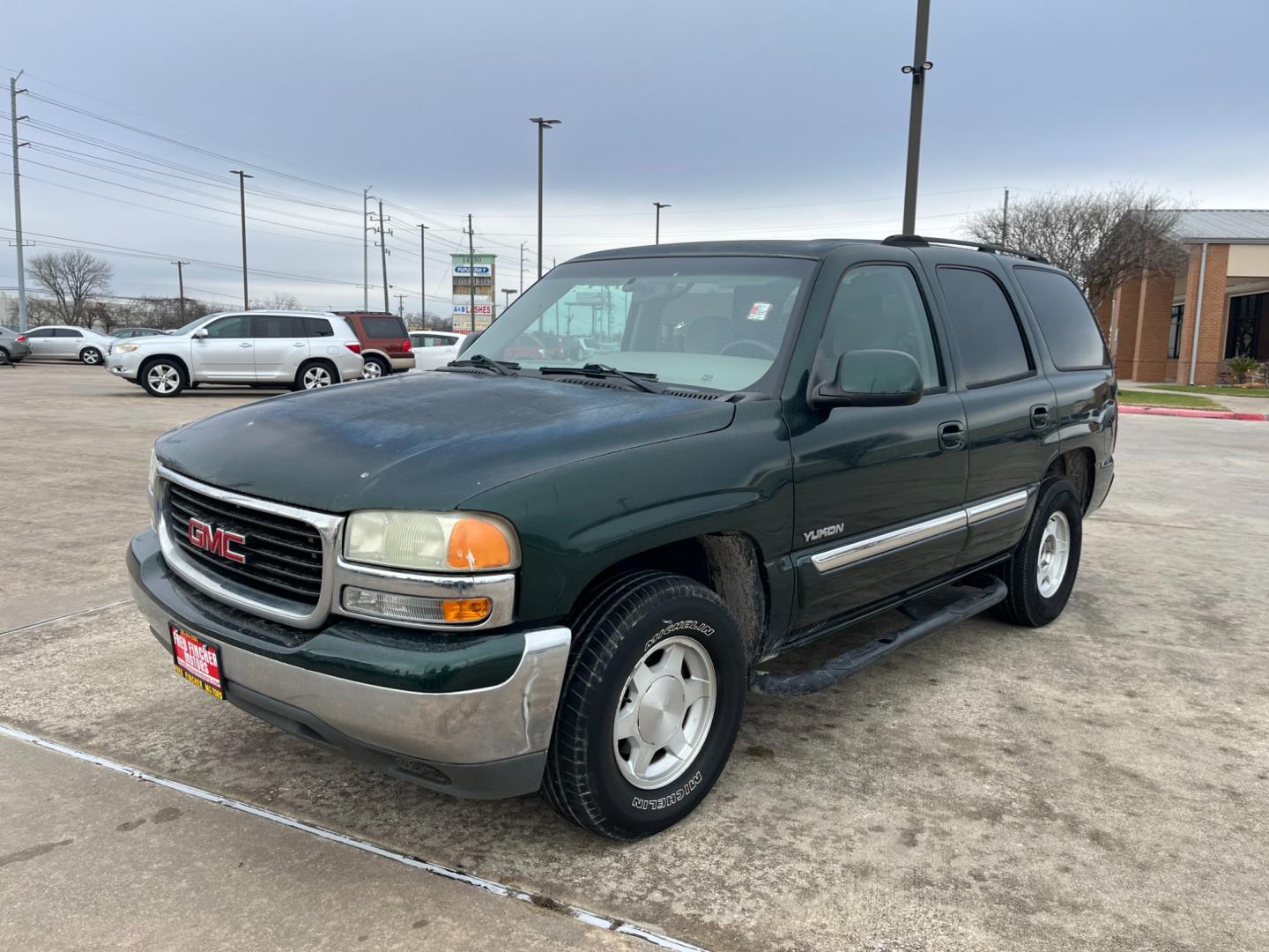 2004 green /TAN GMC Yukon 2WD (1GKEC13V94R) with an 4.8L V8 OHV 16V engine, 4-Speed Automatic Overdrive transmission, located at 14700 Tomball Parkway 249, Houston, TX, 77086, (281) 444-2200, 29.928619, -95.504074 - Photo#2